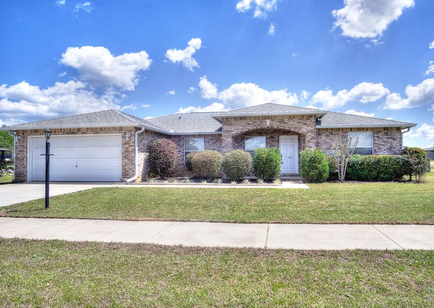 Fantastic home on a flat, half acre lot! This flexible floorplan boasts 4 good sized bedrooms and 2 living spaces. The open kitchen offers up ample counterspace, a center working island, and updated stainless steel appliances. French doors open up to a spacious, flat lot, complete with a privacy fence, garden beds, and a large custom shed. Master bathroom has a garden soaking tub, separate standalone shower, and dual vanities. Spacious walk in closet is located in master bedroom.