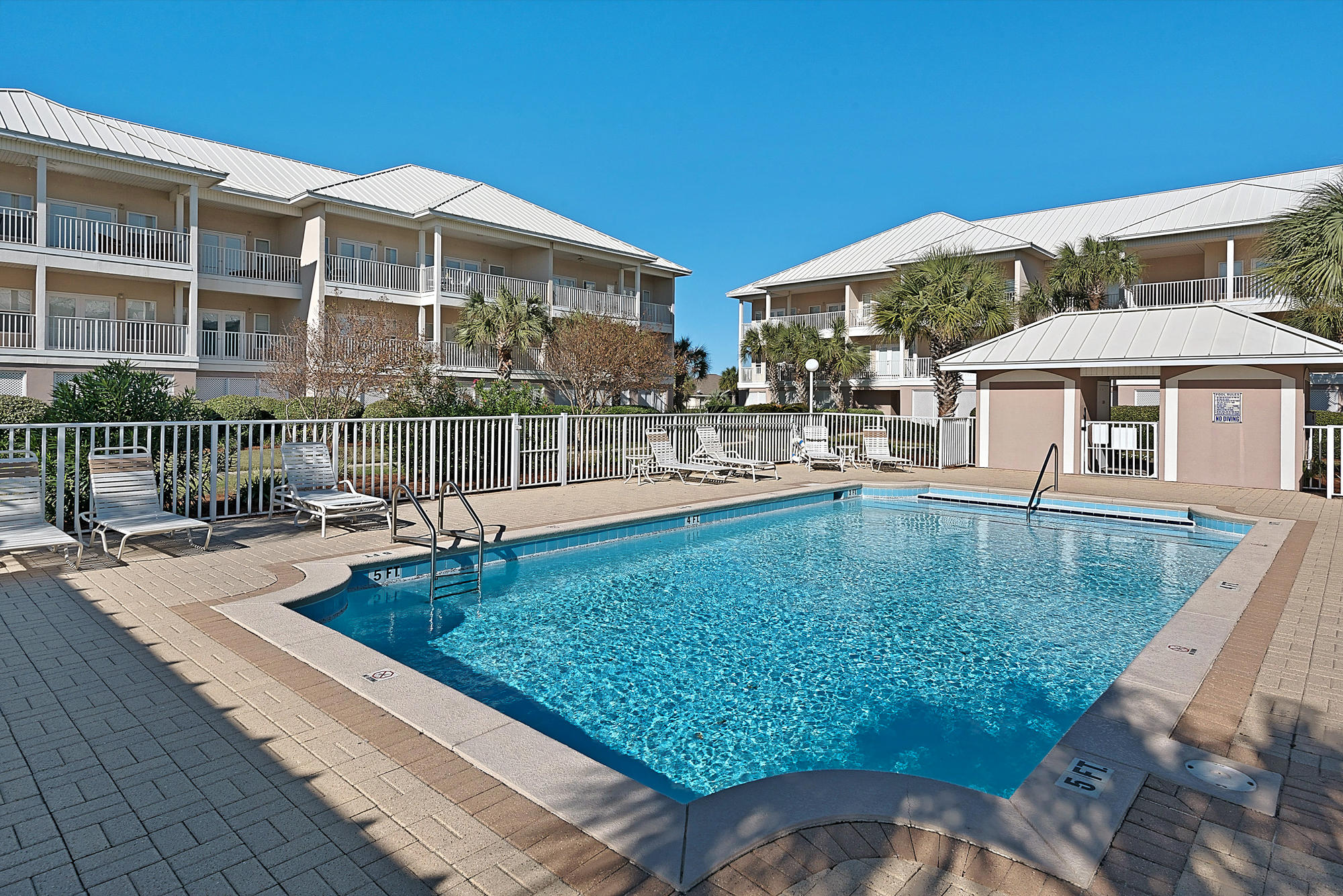 A fully furnished 3 bedroom 3 bath top floor corner end unit located in building A which directly faces the Gulf of Mexico. Boasting gorgeous gulf views, other features include tiled flooring with carpeting in the bedrooms only, 10 foot ceilings, large living area, open kitchen, access to the spacious balcony from both the living room and master bedroom, association assigned garage and outside storage closet. Master suite features a walk in closet, double vanities and a separate shower. Pavilion Palms consists of only 30 units and is a gated community with a seasonally heated swimming pool located a short distance to beach access, Pompano Joe's restaurant and the Scenic 98 pedestrian path. Perfect use for a second home, vacation rental or full time residence. This is a COBRA flood zone.