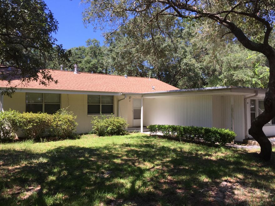 Location location location! Just around the corner from shopping, military bases, and hospital. Across the street from the Bay! Large corner lot with twisting beautiful live oak trees, Magnolias, palms, and azaleas. Property is across the street from the Bay and down the street from the public bay-front park. This home has a living room, family room, master study ,dining room and 4 Bedrooms.Four Bedroom two bath! Tile in the foyer, kitchen and baths. The large kitchen has lots of cabinets, a pantry, refrigerator, dishwasher and stove. The Laundry is detached in a storage by the carport. Beautiful place to raise a family and BBQ. Bring the Paddle Board and the Kayak! Florida Palms, fenced in yard with a fire pit! Beaches Across the road!