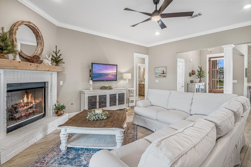 Amazing 2020 built Truland home in the charming community of Buxton's Mill at Hammock Bay. This 4-bedroom home is conveniently one level and positioned on over 1/3 an acre backing up to a serene pond. Enjoy your morning coffee on the covered back porch & enjoy wildlife right from your yard or catch the sunset over the pond. Exterior is brick & hardiboard with a large driveway, 2-car garage and nice landscaping & curb appeal. This is an expansive sized lot for extra privacy with a fenced backyard, large enough for a pool if desired. Craftsman details are apparent in this home starting with the 8 ft. glass & Mahogany front door, beautiful wainscoting in the dining area and intricate crown molding. There is a great natural light with a wall of windows across the home bringing the outside in!