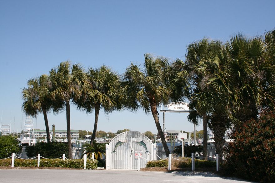 LOCATION IS EVERYTHING! GREAT PLACE TO DOCK YOUR BOAT AND ENJOY THE BEACH.THIS SLIP IS LOCATED ON C-DOCK GO TO RIGHT AS YOU ENTER THE GATE. ONLY MINUTES TO THE PASS AND OUT TO THE GULF OF MEXICO, THIS SLIP OFFERS A WONDERFUL LIFESTYLE. GATED MARINA FOR SECURITY AND PRIVACY WITH 50AMP ELECTRIC SERVICE, CABLE, PHONE AND WATER. FISH CLEANING STATION FOR CLEANING YOUR CATCH.