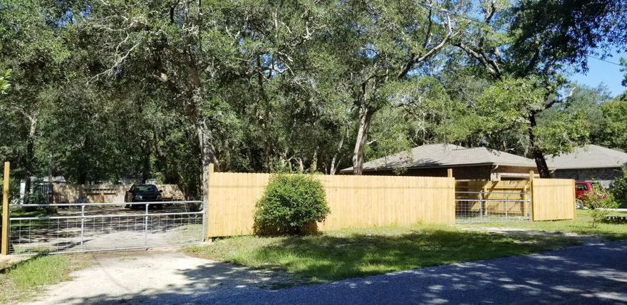Fantastic Lot in Choctaw Beach with endless possibilities! Bring your RV and set up while you build your home or use for a secluded vacation getaway! Property has been recently fenced for ultimate privacy and 2 gates added. This lot has everything you need to include a 30x30 Concrete Slab, Electrical- 50 Amp and 2- 30 Amp power sources, Septic Tank and Private Well with 2 water spigots. Just minutes from Bluewater Bay and Mid Bay Bridge and a short drive to the beautiful Destin beaches! There is a bay-side public park with picnic tables/pavilions, children's playground & boat ramp within 1/4 mile.