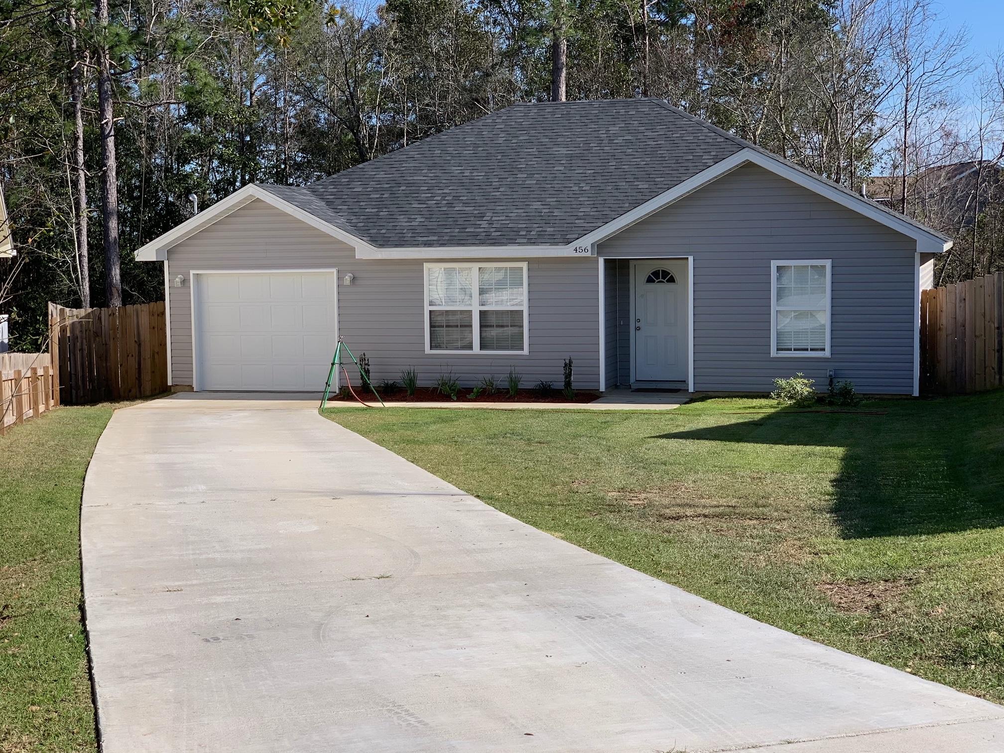 Back on market at no fault of the seller. Great location, south of I-10! New in 2019, 3 bedroom 2 bath, vinyl siding. Laminate flooring in the living room, tile in the kitchen and baths and carpet in the bedrooms. 8 ft ceilings throughout the home. Stainless steel appliances with soft close cabinets in the kitchen. Master Suite offers a double vanity, single vanity in the guest bathroom. Above the garage is finished attic space with a pull down latter. Spray foam insulation. An affordable home you can be proud of that sits south of I-10 letting you avoid the Crestview traffic snarls. Approximately 10 minutes to 7th Special Forces & Duke Field and 15 mts to Eglin AFB. Conveniently located to Antioch Elementary School, Grocery stores, & restaurants.