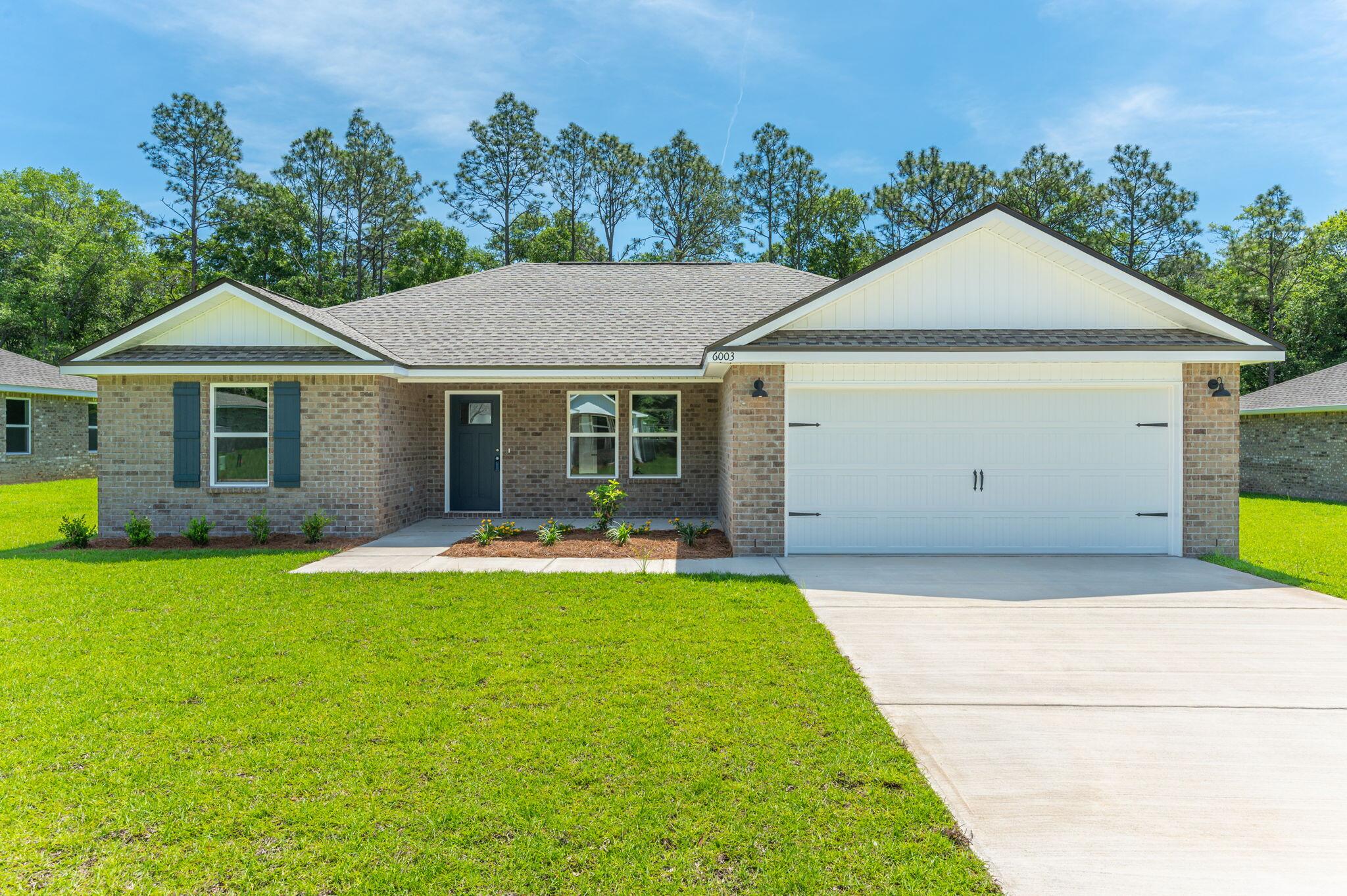 FREE BLINDS/REFRIGERATOR/WASHER/DRYER + $10K TOWARDS BUYERS CLOSING COSTS (restrictions apply) UNTIL JULY 4TH- FULLY LANDSCAPED 1/4 ACRE LOT! Relax on your covered front porch or your rear patio. This new subdivision is just one street with no HOA and low county taxes. Open family/dining/kitchen has raised ceilings and luxury vinyl plank flooring. Kitchen has work island with bar seating, pantry, white shaker style cabinets, quartz or granite countertops, stainless steel appliances. Split bedroom design, owner's bath has double vanities, shower and walk-in closet. Interior colors will vary.