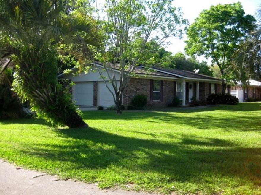 MORE PHOTOS TO FOLLOW**REWIRED***Seller is providing a home warranty!! Very large, beautiful corner lot in the heart of Fort Walton Beach in the much desired Kenwood Area! Convenient to both Bases, shopping, restaurants and schools! Fully sodded yard, lovely landscaped with a fenced back yard. Laminate hardwood flooring throughout with carpet in three of the four bedrooms. Great sized kitchen and very large garage! Must see!! Buyer to verify all measurements.