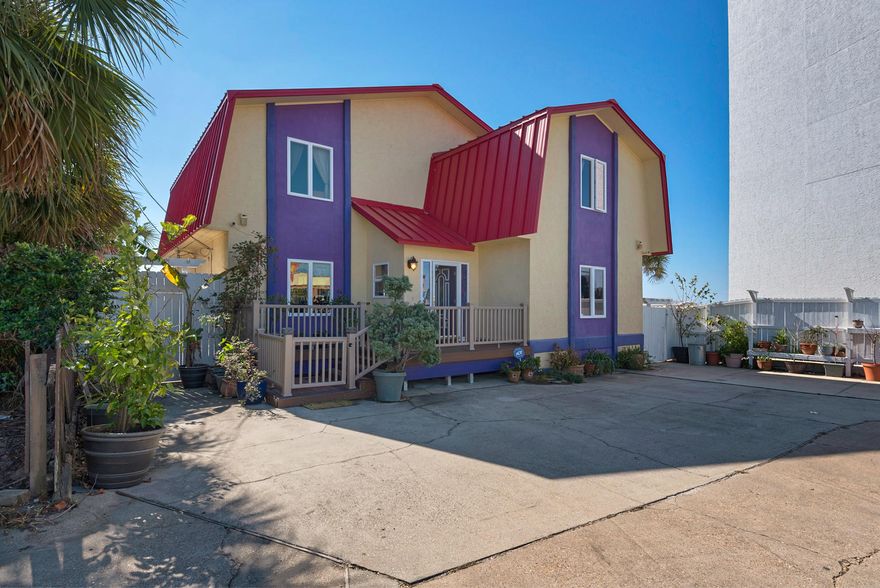 Incredible West End house on a 60x210 lot. Extensive remodel replacing roof and front and rear walls and windows. Top notch construction to hold up to the weather and last a long time. Gulf side of home sheathed with rubber roofing material underneath stucco so even wind blown rain cant penetrate. Aluminum roof to last longer gigantic windows to maximize the views. 4 large en suite bedrooms, 2 up and 2 down, 2nd living area upstairs with bunk nook. The house can comfortably sleep 20 in beds! Rental income potential is huge. And even better, the current zoning is PCB Commercial High Intensity! The kitchen was also remodeled and has brand new appliances and granite countertops. The floor plan flows easily out to the enormous 1000+SF deck. The prop app site shows home has 60x8 seawall