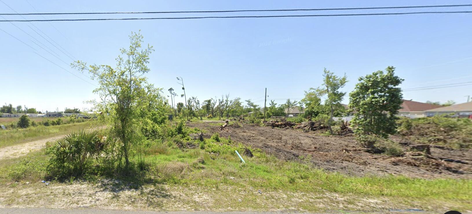 Great Cleared Buildable Acre with City Water and Sewer available and tap fee paid. Up and coming Community of single family homes (many new). Come build here!