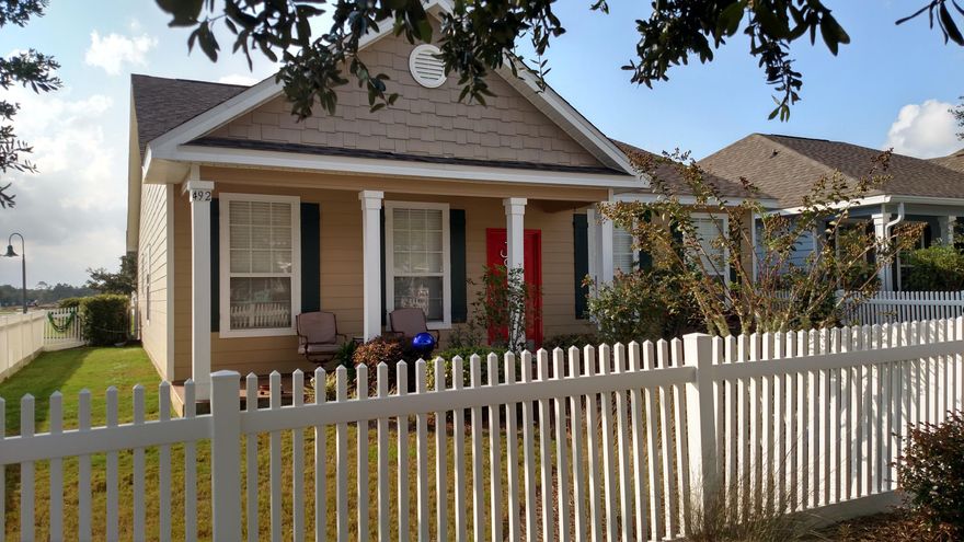 Welcome home to Hammock Bay community. A place for your family to grow. This 3 Bed 2 bath craftsmen home is in fantastic condition. Freshly painted inside and out. New Plank flooring going in. Ceramic tile in all traffic and wet areas. A large family/living room greats your guests. Full size dining room, Kitchen has room for breakfast table. All Kitchen appliances convey.Master Bed room suite offers a Large bedroom, walk in closet and full bath with double vanity.Fully sodded yard, irrigation system. Fully fenced for those four legged family members. Parking in back and front of home up to 4 vehicles. HOA dues pay for extensive community amenities, cable and all your landscaping...not just yard mowing but all landscaping making it virtually maintenance free.