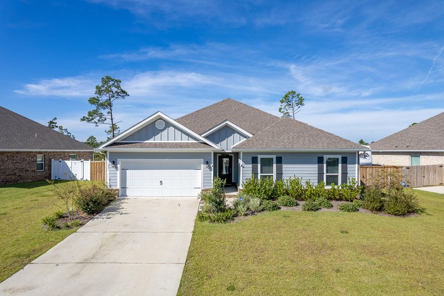 We love this home in the Fanning Bayou community. This awesome home has wonderful features such as an open floor plan, large master suite on one side of the home, and the additional 3 bedrooms on the other side. The kitchen is beautiful! It comes complete with granite countertops, center island with undermount stainless steel sink and a walk-in pantry. The master suite comes complete with a walk-in closet, garden tub, separate shower & double vanity. There is a screened porch with an entertainment bar with led lighting and a TV. The yard has an irrigation system, back yard is completely fenced & gated on each & backs up to a conservation area. The community includes a Resort style pool, covered pavilion & picnic area. This is a quiet community yet only 30 min to beach & 20 min to town.