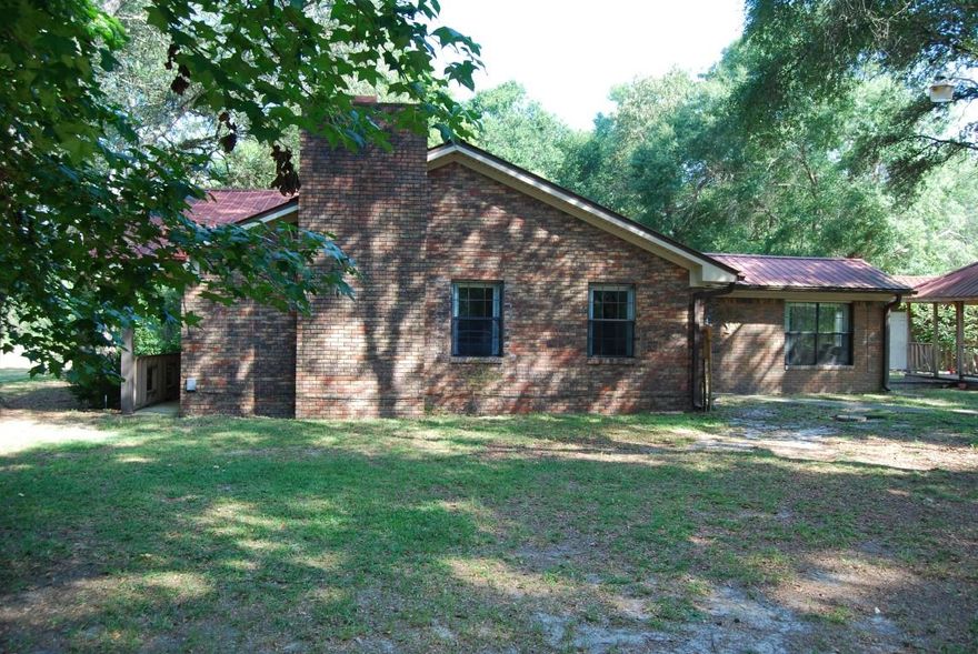 ''BRING YOUR HORSES'' ALL BRICK RANCH HOME WITH 5.63 ACRES ON THE SOUTH SIDE OF CRESTVIEW AND ITS NOT IN THE CITY LIMITS. 3 BEDROOMS AND 2 FULL BATHS WITH A LARGE GREAT ROOM WITH VAULTED CEILING AND A WOOD BURNING FIREPLACE. KITCHEN WITH A LARGE DINING AREA, INSIDE UTILITY ROOM AND KITCHEN APPLIANCES ARE INCLUDED ALL FLOORS ARE EITHER LAMINATE OR TILE. PROPERTY IS FENCED AND CROSS FENCED FOR LIVESTOCK OR HORSES, A POND, LARGE WORKSHOP/GARAGE A COVERED GAZEBO, ANOTHER POLE BARN WITH ROOM FOR TWO CARS, PLUS A COVERED POLE BARN WITH TWO HORSE STALLS AND ANOTHER STALL FOR A TACK ROOM. GROUNDS ARE BEAUTIFUL WITH LOADS OF PRIVACY. CONNECTED TO COUNTY WATER BUT HAS A WELL FOR WATERING PURPOSES. VERY PRIVATE AND SERENE SETTING AT AN OUTSTANDING PRICE. BEING SOLD AS IS WITH RIGHT TO INSPECT.