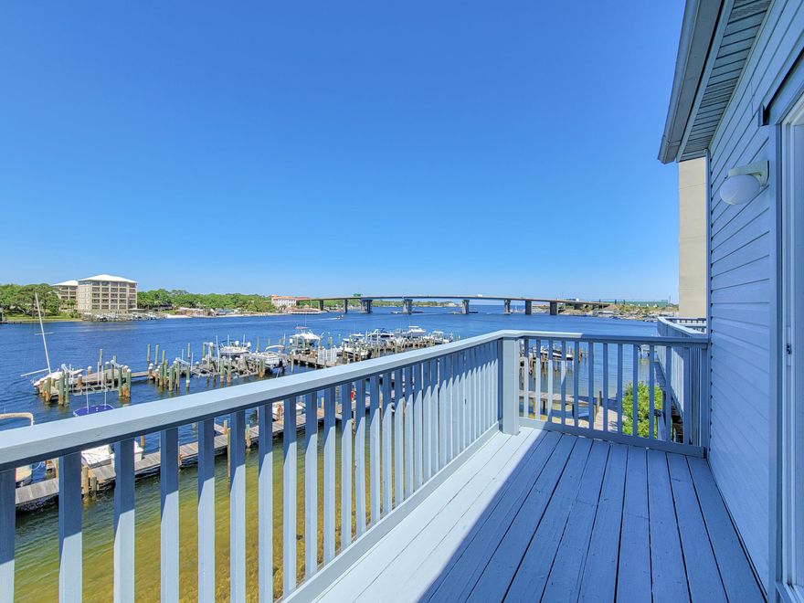 The Perfect Waterfront Investment or Vacation Home!! Commodore's Landing sits on the beautiful Sound in Fort Walton Beach and has a community pool, assigned parking, and marina with boat slips available to rent. This 2 BR + Loft unit is WATERFRONT and has fantastic views of the Santa Rosa Sound. The perfect spot to watch fireworks at the Landing! Inside on the main level you'll find an open concept kitchen, living, and dining area with ample amount of natural light and storage space. Kitchen has updated stainless-steel appliances, breakfast bar, and nice tile backsplash. Also on first floor is a laundry closet and half bath. Step out to the balcony and watch boats pass under the FWB Bridge .... see more!