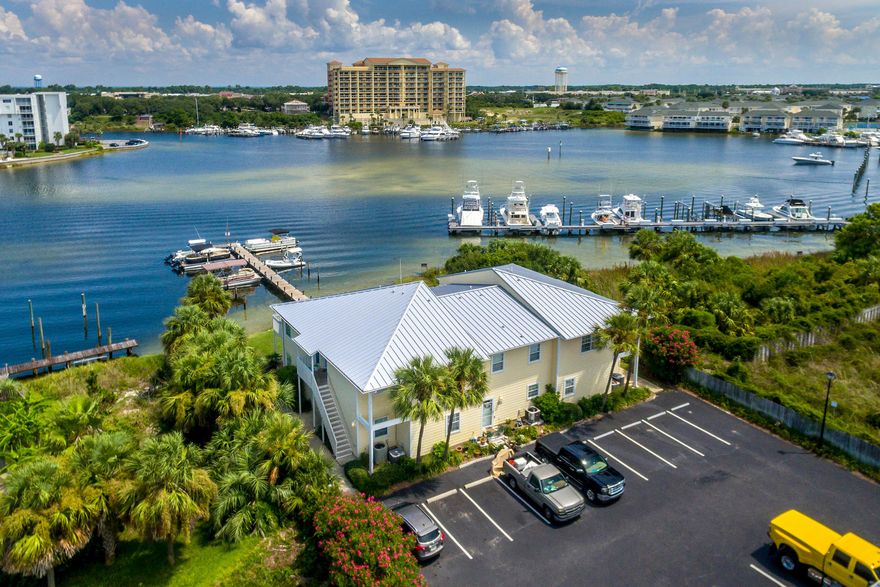 Looking for an affordable condo with easy access for the Destin Harbor? You just found it! Convenient boating access doesn't get any easier than with this one...Step right out of your back door and on to your boat! This adorable two bedroom, two bath condo, located in the popular Destin Sands on Holiday Isle, is a boater's delight with easy access boat slips on the dock, all within a short stroll to the beach, too! This unit was completely remodeled in 2016. Interior appointments include granite countertops, updated cabinets, tile flooring, stainless steel appliances and more. Dock your boat here or walk out the back door with your paddle board and enjoy the Destin life! Call today to see this gem!