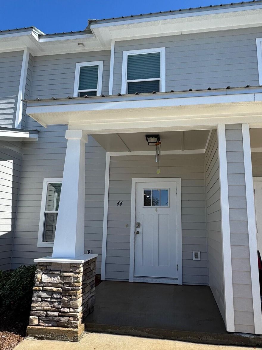 Welcome to the Verandas at Freeport! This townhome has been freshly painted and is move-in ready. You will enjoy the light and bright living space with an open floor plan. Home has LVP flooring throughout for easy living and cleaning. The first floor features a well-appointed kitchen, with granite countertops and stainless-steel appliances, breakfast bar, living room/dining room combo, and half bath. The two bedrooms and two full baths are located upstairs, along with laundry area. Out the back door you will find a private patio with storage room, and wide-open community green space. The home is a short distance to the community pool, pickleball court, basketball court, swing set, and mail pavilion. Located just minutes to the beaches of South Walton and 30A via the 331 bridge