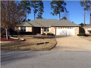 JUST REDUCED! MOTIVATED SELLER! Rocky Bayou Huntington Estates! This custom built home by Langford & Mills, features a split floor plan. Large master suite with spacious bedroom, dual vanities, and dual walk-in closets. Other two bedrooms have a jack and jill bathroom. The fireplace is the focal point in the spacious great room with hardwood floors, dual ceiling fans and cathedral ceiling. The kitchen has plenty of cabinetry, electric cook top, dishwasher, disposal, range hood, built-in oven and refrigerator. Enjoy your meals in the breakfast area or the formal dining room (currently used as an office). Lawn is nicely landscaped with sprinkler system. Back yard is quite spacious, just waiting for you to install a sparkling in ground pool. Dimensional shingle roof (replaced in 1997)