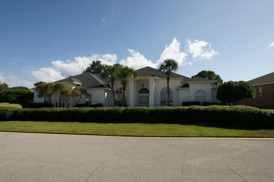 Elegant and spacious home on the 15th tee / fairway. Home is at the end of the cul-de-sac. The kitchen is a chef's dream featuring a large Thermador gas cook-top with grill and griddle, Thermador professional vent hood, and sub-zero refrigerator/freezer. Dual convection ovens with microwave feature. The large pantry will neatly accommodate your storage needs. Large master bedroom leads to the luxurious master bath with large whirlpool tub, spacious shower, his and hers sink / dressing areas, and his and hers walk in closets. Two of the guest bedrooms have their own 1/2 baths with a shared tub room. Ample laundry room has room for refrigerator and / or freezer. Large screened porch / Florida room. Over sized garage. Generous attic storage.