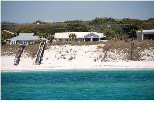 Seaside Blitz is a gulf front home located in the the Heart of Seagrove Beach on an 80 foot lot with exspansive views East and West, and just a short stroll to Seaside and the Seagrove market/V restaurant, or take a 5 minute bike ride to Watercolor. This home has undergone a partial renovation with new kitchen and master bath, fresh paint, HVAC and more. Property features include 2 master suites with private baths, one bunk room, 2 living areas and a 2 car garage that is currently utilized as a game room. Home is sold ''AS IS'' and is furnished with some personal exclusions and is currently on the Ocean Reef Resorts vacation rental program. There is not an HOA associated with this property so no additional fees.