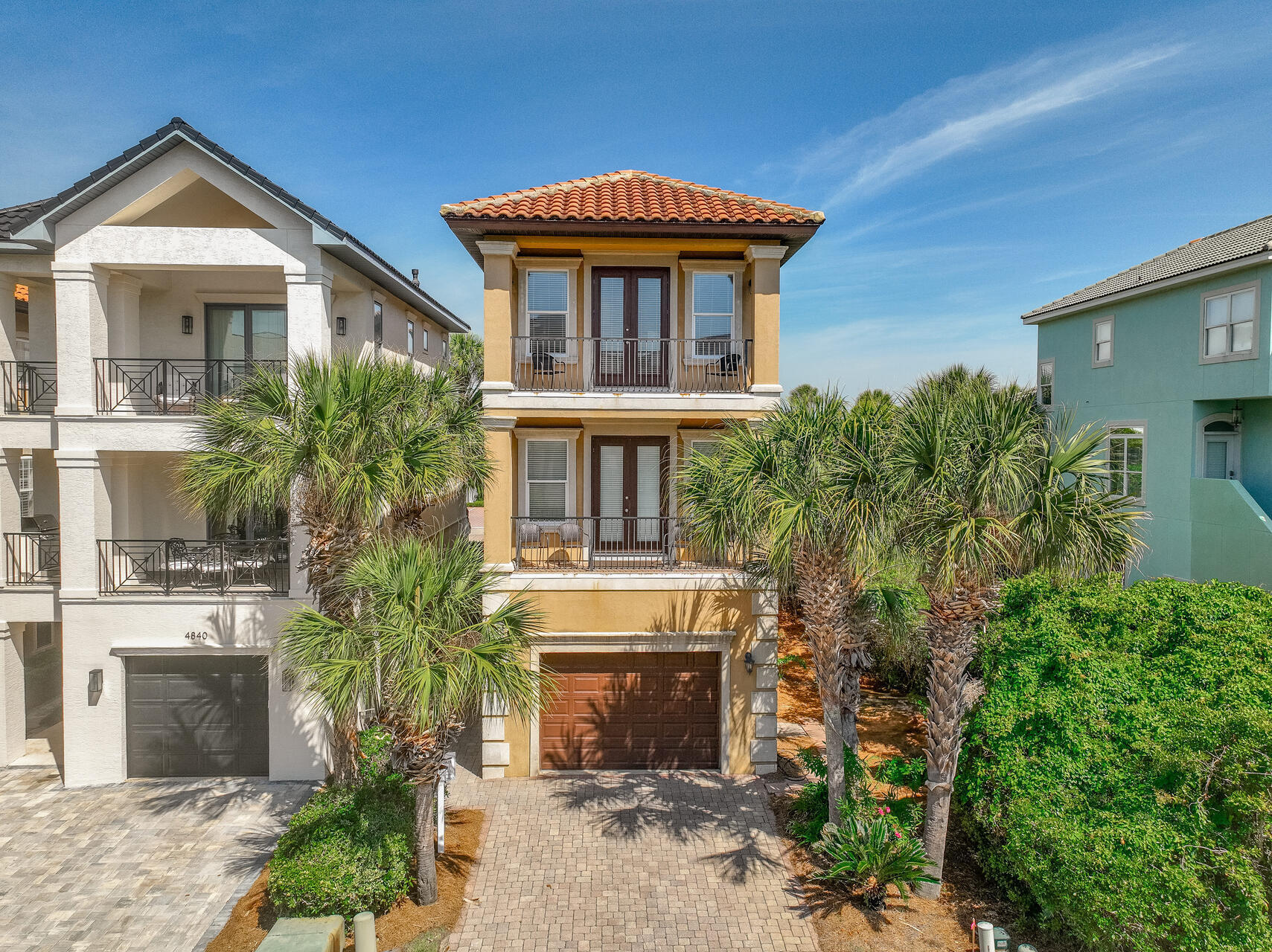 Destiny By The Sea - an exclusive gulf front gated community with an expanse of private beach. Once inside this private enclave you'll find one of Destiny's best beach vacation homes offering 5 luxurious and well-designed bedrooms w/ensuite baths, spacious 2nd floor living areas, 2 south facing balconies, open kitchen, ample parking, plenty of storage space, elevator, and much more. AND all within a short stroll to the private beach and pool. This magnificent home sleeps 14 comfortably and is spacious enough to accommodate all those cherished family beach vacations.