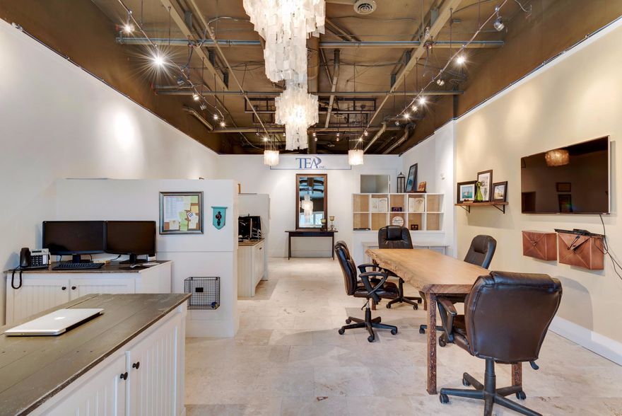 Back on Market. Seller willing to sign a long term lease. This is an excellent investment opportunity at this price. Modern interior with open spaces and employee bathroom available. Security alarm installed. Room to expand with small kitchen in media area. Ownership in this unit comes with access to the swimming pool, playground, outdoor grills, owner's lounge, theater, fitness room, and trolley service to the dedicated beach access located off of Blue Mt. Road. After work you can walk to grab an ice cream cone at the Blue Mt. Creamery or have a cocktail at Trebeche. This is more than an office space, it is a lifestyle. Space is suitable as an office or retail space.