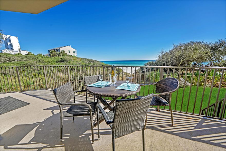 Come take a tour of this beautiful furnished condo, located in the heart of Seagrove at Legacy Condominiums. Beautifully remodeled, with the feel of seclusion and privacy are just a few short words to describe this exquisite luxury condominium. Enjoy the lush scenery of the dunes overlooking the beach. You'll feel like the sparkling emerald Gulf waters are right at your fingertips while in this unit. The view in person from this unit is truly special and is a MUST SEE in person.  This unit is located in a gated complex on the ground floor, making it private with easy access directly to the beach, as you will be able to walk directly down to the beach right from your own balcony.