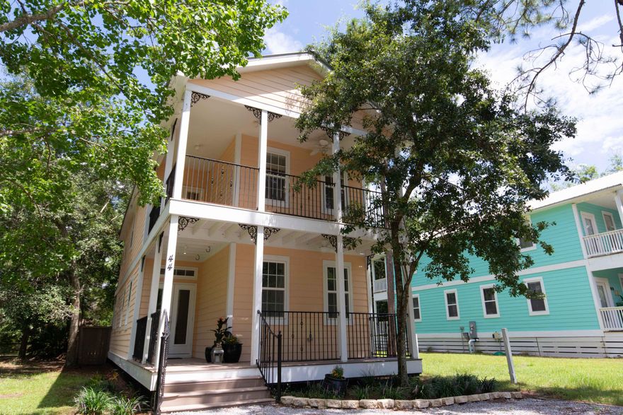 This is a recently renovated 3 bedroom, 3 bath home with a fenced back yard. The home has many recent upgrades including new granite counter tops, stainless steel appliances, new floors throughout main floor living areas. This home is perfectly situated in Santa Rosa Beach just off 393, near Cessna Landing Boat Launch. When you walk through the front entry hall of this home you are greeted by an open floor plan with the kitchen open to the living room and dining area. A perfect layout for entertaining guests. There is a first floor bedroom and bath to the right of the front door, and then the spacious master suite and 2nd guest room with an on suite bath are upstairs.
The master bedroom has a private balcony that overlooks the back yard, and features a walk in closet and a large bathroo with a double vanity and separate shower and tub.