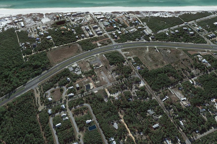 Build your dream home in this amazing development in South Walton County in the Grande Pointe community. Grande Pointe is nestled next to Powell Lake and a nature preserve. The lake pavilion has a large community room, swimming pool and dock on Lake Powell.
Conveniently located at the east end of US 98, Grande Pointe is close to all the shops, restaurants and entertainment of Rosemary Beach and the new shops of 30Avenue.