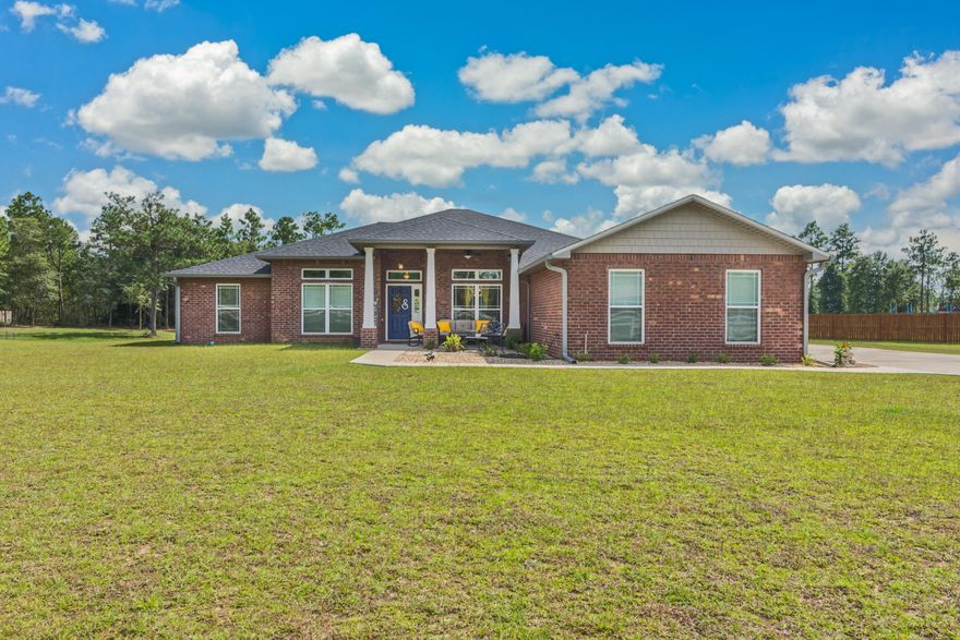 What a stunner! This 2687 sq foot, 4 bed/3bath home (WITH formal dining, office, and LARGE Florida room too!) welcomes you from the large yard, white picket fence and large front and back porches to the beautiful interior. You are welcomed with beautiful shades of grey on the walls and LVP flooring in all the main areas. The kitchen is fit for a chef with two large pantries, island, granite and stunning oversized cabinetry. Tiled backsplash and stainless steel appliances. Split floor plan with a mother in law quarters off the FL room. The master suite will fit any furniture. Two large walk in closets, separate shower, large soaking tub and double vanities. Home is on over one acre with 3 car garage. Neighborhood has community gazebo with fishing ponds, playground and trails.