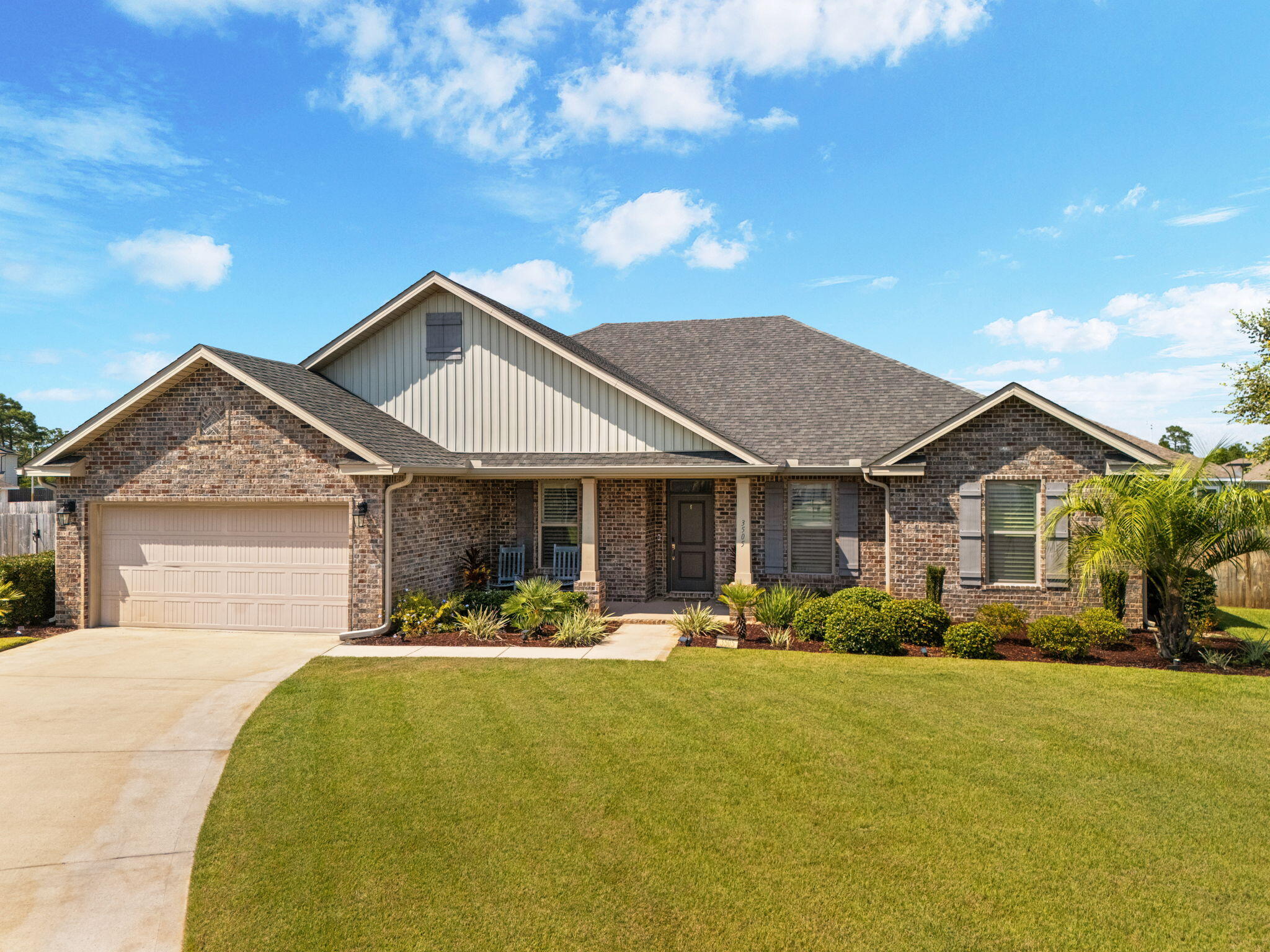 Welcome to your dream home in this charming Gulf Breeze neighborhood! This stunning all-brick beauty sits on a generous third-of-an-acre lot that offers privacy and plenty of room to spread out. With a privacy fence surrounding the property (6 ft on the sides and 8 ft in the back), you'll feel like you have your own personal retreat complete with young fruit trees and space for that pool you've been dreaming about.Step inside this thoughtfully designed 4-bedroom, 3-bathroom home featuring 2,326 square feet of comfortable living space. The open concept layout flows seamlessly from room to room, making it perfect for both daily family life and entertaining friends. The heart of the home showcases a gorgeous kitchen with shaker cabinets, a convenient island, elegant quartz counters and stainless steel Maytag appliances that make cooking a joy.
You'll love the luxury vinyl plank flooring throughout the common areas and cozy wall-to-wall carpet in the bedrooms. The primary bedroom is a true sanctuary with its tray ceiling, double vanity, relaxing garden tub, tiled stand-up shower, and spacious walk-in closet. Plus, there's a bonus room that can easily transform into an office, playroom, or even a fifth bedroom depending on your family's needs. There is also a separate dining room that can be converted into another flex space!!
The outdoor spaces are just as impressive as the interior. Relax on the covered front porch or enjoy the screened-in back porch and paver deck where you can unwind after a long day. The two-car garage provides convenient parking and storage.
Located in the desirable Gulf Breeze area, you're just minutes from shopping at Walmart Supercenter and Publix, plus Tiger Point Park for outdoor fun. The Gulf Breeze Zoo and beautiful Pensacola Beach are nearby for weekend adventures. This neighborhood truly offers the perfect blend of suburban comfort and coastal living. Be sure to check out the video!!
