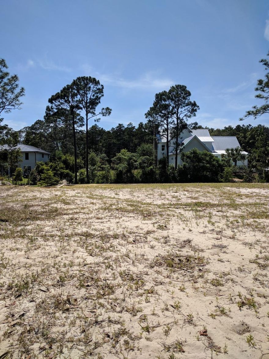 Unique, canal front lot in peaceful Pt Washington. High and dry lot is ready to build. All the hard work has been done, including numerous custom crafted structural features already in place. Looking west over the canal, you see natural shoreline, followed by neighbors green space, then State forest. No home directly across the canal from the lot. So you are not looking into your neighbors house. Homes across the canal are recently built and of very high quality! Lot has a 50x15 foot bulk headed slip cut into the lot. Possibly accommodate a 45' trawler or multiple boat lifts. Short run down the canal to the bay. Canal is maintained by the Canal Assoc. regularly dredged to maintain 4 ft depth. House plans available.