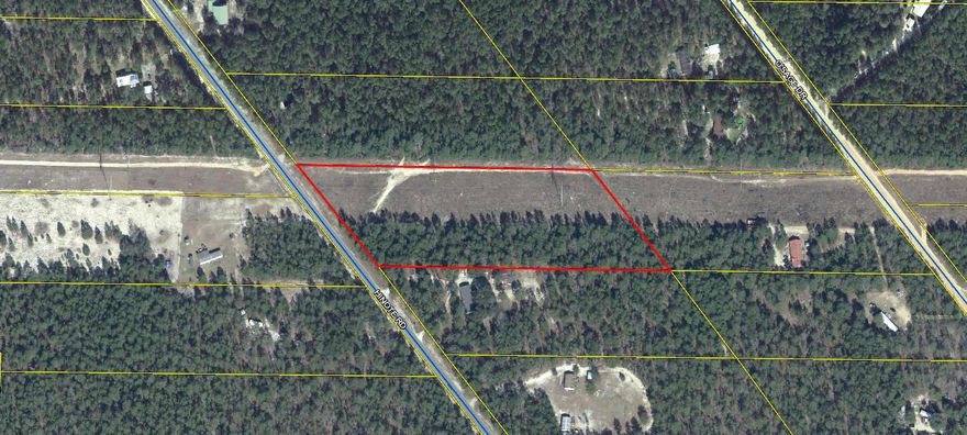Very nice 6.2 acre parcel. The north half is a power line easement, which the Seller has kept mowed. This could be the play area. The south half has been cleared in the middle and has a new 18x27 RV port and a new 3-sided 18x20 utility building. This could be the living area. The property is gated and fenced front and back. Power and water are on Hinote Road. It is located approximately 10 minutes from the I-10 Mossy Head interchange and 20-30 minutes from either DeFuniak Springs or Crestview.