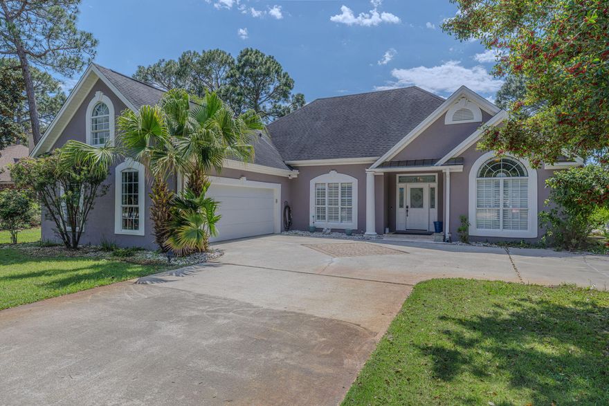 Welcome to costal living in the heart of Destin right on highly sought after Indian Trail! As you pull into this home you will immediately feel as if you've arrived to paradise. When you enter the home you're invited with natural lighting, coffered ceilings, shiplapped walls, tile flooring, updated primary bathroom, and recently renovated kitchen with gas stove and updated appliances. The spacious floor plan with exquisite updated details makes this home feel like new. Enjoy the outdoor lifestyle with your own private screened-in pool. Perfect for entertaining guests or enjoying some quiet time floating in the privacy of your own backyard. Located in the heart of West Destin, you are conveniently located to many of Destin's top rated restaurants, grocery stores, shopping, & beach living!