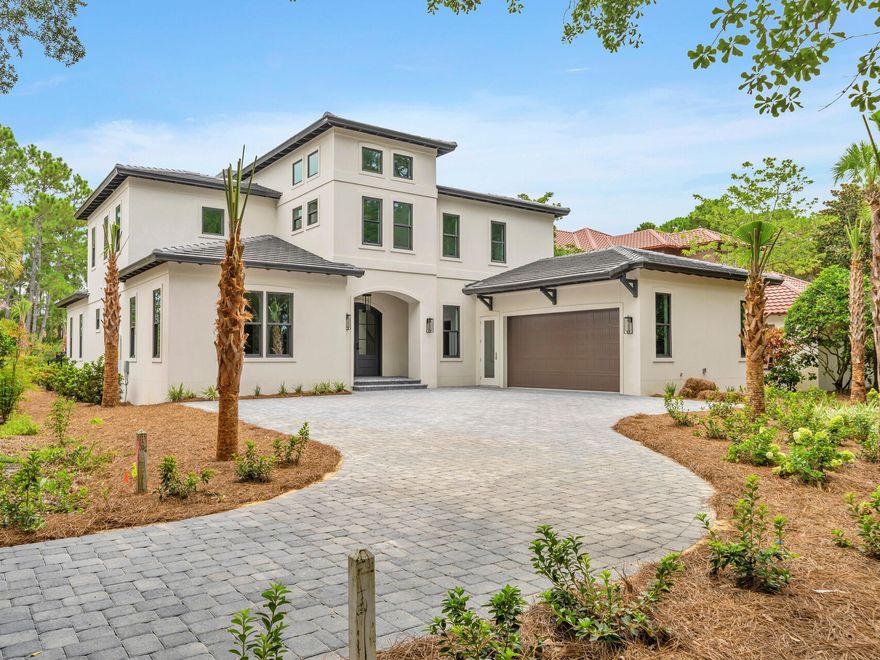 This brand-new waterfront home occupies a prime 0.27-acre lot in Del Mar at Sandestin. Another quality home built by Coastal Custom Home Building, This imposing property backs onto a serene pond offering unspoiled views from the private pool terrace. With 71 feet of water frontage and a new sea wall. At the front of the home, a sweeping driveway provides ample parking for multiple vehicles along with an oversized garage that includes space for a golf cart. There's access directly into the home through the laundry room and via a grand formal entrance into the foyer. The expansive great room is well laid out with designated spaces for living, dining and entertaining. Ten-foot ceilings and engineered hardwood flooring enhance this elegant space, providing a blank canvas for new owners to ad their mark. Multiple doors open directly onto the covered terrace and pool. It's a place to dine, relax and enjoy wonderful views of the tree-lined yard and lake. The kitchen is an inspiration for keen cooks and those who like to entertain. It has a long central island with seating, a useful butler's pantry and all-new Monogram appliances including a range with hood. Quartz countertops add a touch of understated luxury. Three first-floor bedrooms conveniently allow for living all on one level, if desired. The huge primary suite has pool and lake views along with a spa-like bathroom boasting twin vanities, a stand-alone tub and a separate shower. Two additional bedrooms are spacious and well-appointed with walk-in closets and private bathrooms. Stairs lead up to the spacious second-floor media area, which has soaring ceilings. Clerestory windows deliver abundant natural light to this bright and airy bonus space. Doors lead into a magnificent master suite with walk-in closet and a master bathroom with tub and shower. The split floor plan includes a second bedroom on this level, also with private bathroom and walk-in closet. Offering a resort lifestyle, this enviably located home is brand new and move-in ready. It features some automation along with a tankless hot water system and two A/C units. The fenced yard provides a sense of privacy and security around the in-ground pool. This is an unmissable opportunity to secure a primary or second home in an upscale neighborhood that does not permit short-term rentals. Championship golf courses, a marina, restaurants, tennis, pools and amenities are a short golf cart ride away. 4-seater golf cart conveys with the purchase of the home. 