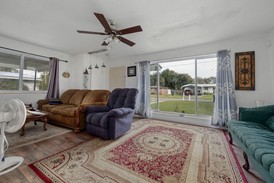 *** $10K IN SELLER CONCESSIONS*** This 3-bedroom, 2-bathroom home features a 2022 tankless water heater, and a 0.21-acre lot. Enjoy the extended family room, perfect for added comfort and entertainment. An ADDITIONAL living space off the side of the house is already AC-ventilated and can be converted into a rental unit for extra income. Plus, the spacious laundry room provides the potential to add a third bathroom. This property is an excellent investment opportunity. Being sold As-Is. Home will need a new roof. If the buyer wishes to keep any furniture, please include details in the offer.