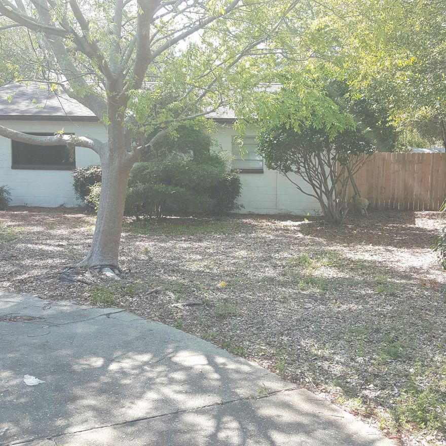 BACK ON MARKET DO TO BUYER'S FINACING.You will love this cute home with great yard. Lots of trees in front and walkway bridge in backyard. No carpet all tile through out this home. Roof 2015 Ac fairly new. All appliances stay including washer and dryer. Come view this adorable home and make us an offer. Close to both bases Eglin and Hurlburt. Close schools and shopping.