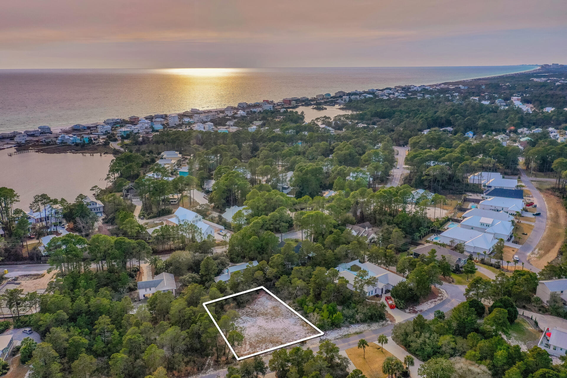 **Under Contract** Accepting Backup Offers. Large .35 Acre Cleared Lot with Paid Tap Fees, Water Meter installed, No Flood Zone and NO HOA, available at one of the highest points in Dune Allen Loop with short stroll to the 3 beach access points with NO HOA! One of the last undeveloped lots in the area and located at the top of Hillcrest Rd providing the potential for fantastic Gulf and Golf course views from 2nd or 3rd levels. Just a golf cart ride from the renowned sights and views of Scenic 30A, Topsail State Park, Santa Rosa Beach Golf and Country Club, and Santa Rosa Beach. The 30A lifestyle offers the best in shopping, restaurants and nightlife. Just minutes from Hiking, Golf, Biking, Kayak fresh water Oyster lake with views of unspoiled Nature and Wildlife!