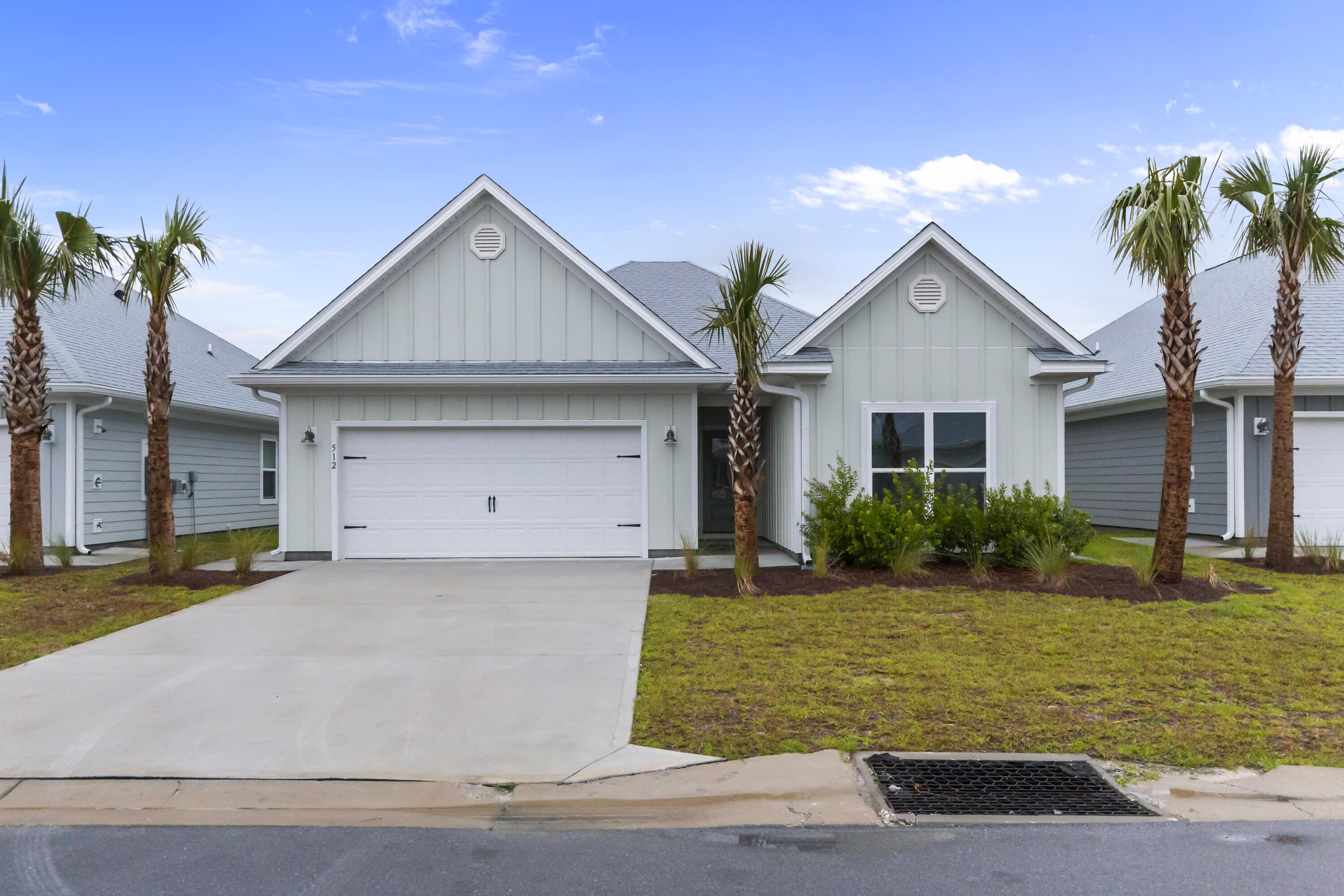 This stunning Kennedy floor plan home located in the picturesque WindMark Beach community of Port St. Joe, Florida. This beautifully designed residence seamlessly blends modern elegance with coastal charm, featuring an open-concept layout highlighted by soaring 9-foot ceilings and abundant natural light. The chef's kitchen boasts sleek granite countertops, under-mount sinks, and stylish 5-panel wood doors, all set atop durable engineered vinyl plank flooring that flows throughout the home's spacious 4 bedrooms and 3 bathrooms. A private mother-in-law suite, complete with its own entrance, full kitchen, bedroom, bath, independent climate control, and laundry area, offers versatile living options perfect for extended family or p Beyond your doorstep, WindMark Beach offers deeded beach access, scenic boardwalks, miles of trails, a resort-style pool, a state-of-the-art fitness center, charming shops, delightful restaurants, and secure, friendly neighborhood vibes. Embrace a lifestyle of relaxation, convenience, and natural beauty in this exceptional home and vibrant community.