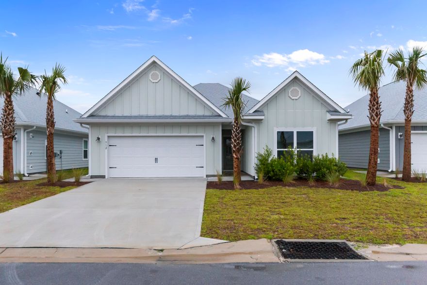 This stunning Kennedy floor plan home located in the picturesque WindMark Beach community of Port St. Joe, Florida. This beautifully designed residence seamlessly blends modern elegance with coastal charm, featuring an open-concept layout highlighted by soaring 9-foot ceilings and abundant natural light. The chef's kitchen boasts sleek granite countertops, under-mount sinks, and stylish 5-panel wood doors, all set atop durable engineered vinyl plank flooring that flows throughout the home's spacious 4 bedrooms and 3 bathrooms. A private mother-in-law suite, complete with its own entrance, full kitchen, bedroom, bath, independent climate control, and laundry area, offers versatile living options perfect for extended family or p Beyond your doorstep, WindMark Beach offers deeded beach access, scenic boardwalks, miles of trails, a resort-style pool, a state-of-the-art fitness center, charming shops, delightful restaurants, and secure, friendly neighborhood vibes. Embrace a lifestyle of relaxation, convenience, and natural beauty in this exceptional home and vibrant community.