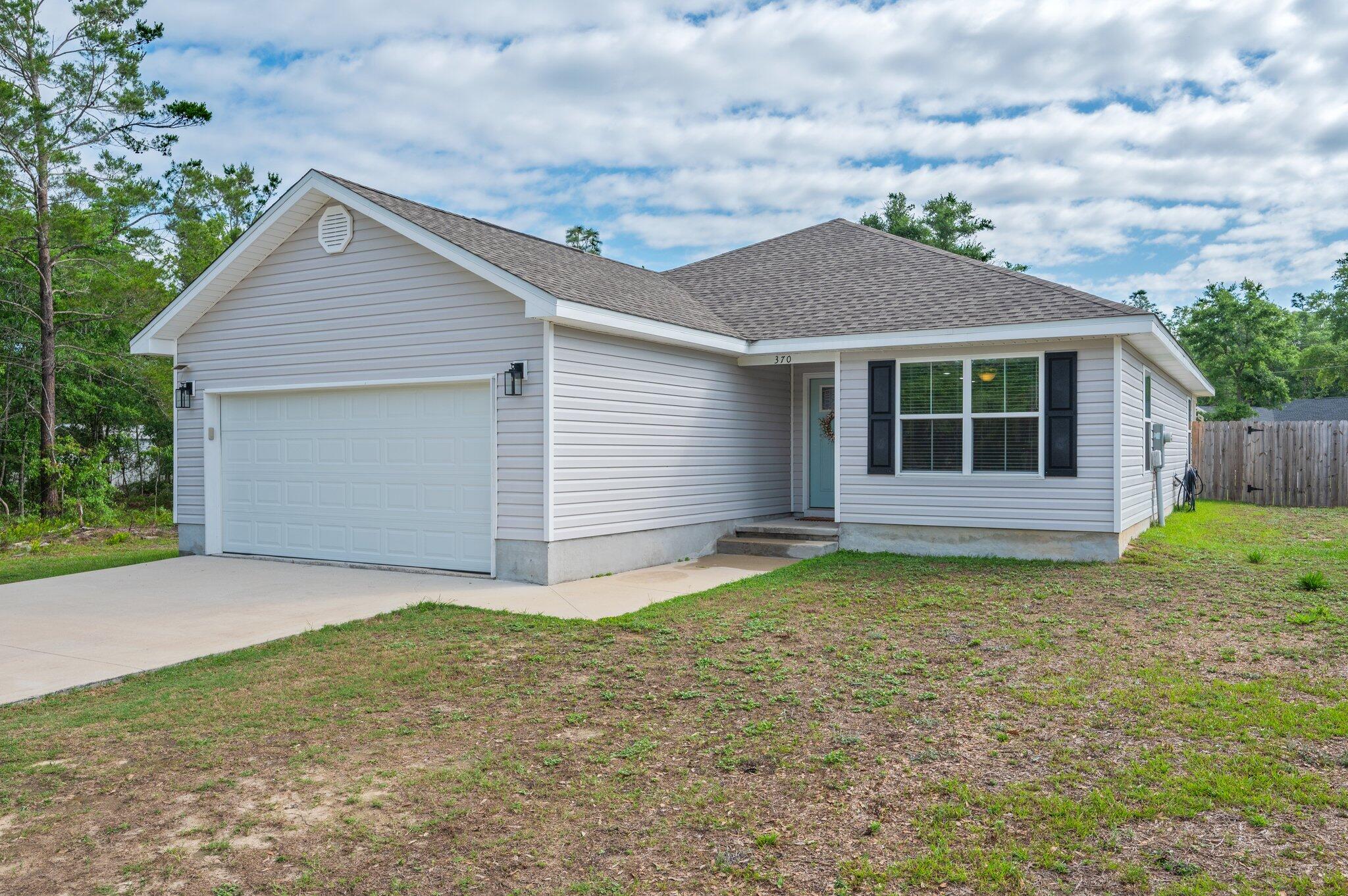 Priced below appraised value, this beautifully maintained home on .33 acres offers comfort, functionality, and stylish finishes throughout. Step inside to discover an open living space featuring luxury vinyl plank (LVP) flooring and tray ceiling that adds a touch of elegance.The spacious kitchen boasts granite countertops, tile flooring, pantry, and modern appliances. Master suite is a peaceful retreat with tray ceiling, walk-in closet, a double vanity in en-suite bathroom, and dedicated linen cabinet for added storage. Tile flooring in both bathrooms and the kitchen ensures easy maintenance and durability. Additional highlights include a large laundry room, two hallway storage closets, and an attach garage for extra convenience. Crossed fenced backyard is ideal for pets or a garden area.