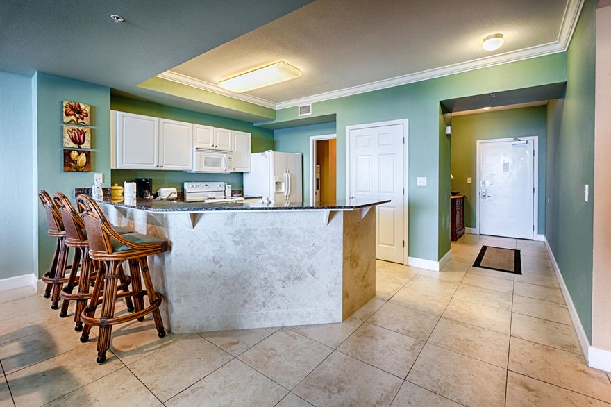 $42,000 IN RENTAL INCOME!!! This move-in ready condo has the square feet to accommodate both vacation rental or full time living! Boasting 1593 square feet, the ''A'' Floorplans at Tidewater Beach are a value like non-other. The average price per square foot for all 2 bedroom gulf front condos in Panama City Beach is $248 a square foot. This is your chance to acquire a luxury condo for $225! The current owners have done a masterful job with the updates and dcor, including wall to wall 12 inch tile, Frigidaire appliances, granite countertops and crown molding. Tidwater Beach Resort is in a great location, minutes from Pier Park and adjacent to Hwy 79 which takes you out of traffic and straight to the airport if needed. Amenities include 3 pools, game room, sky high owner's lounge a