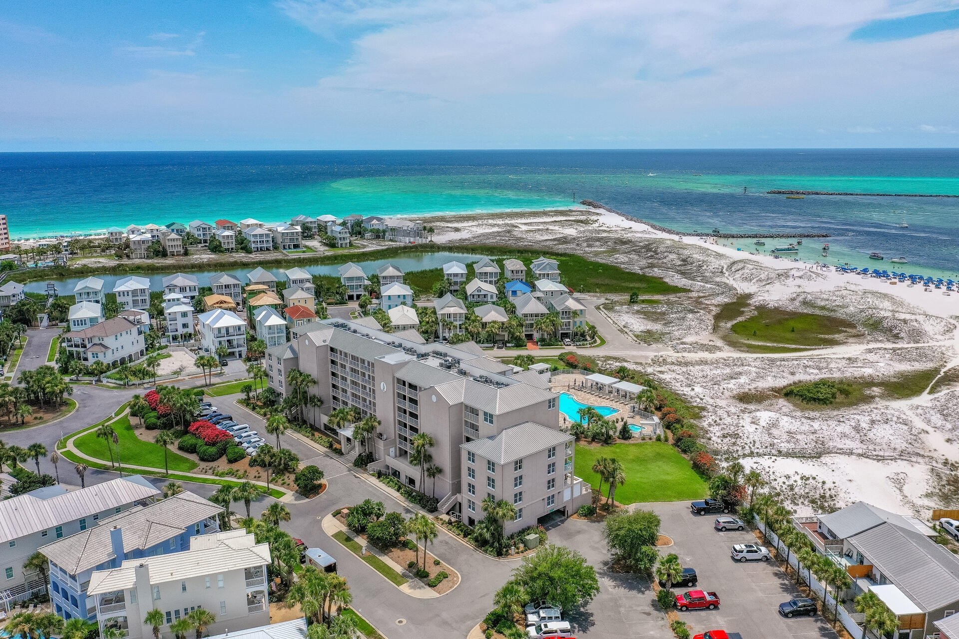 This Condo has AWESOME GULF & PASS VIEWS... 2 BEDROOM 2 BATH, 895 SQ. FT. UNIT AT MAGNOLIA HOUSE, IN DESTIN POINTE One of the last natural and unspoiled, beautiful spots in Destin, Florida. Views abound in all directions that is perfectly located on the 3rd floor at Magnolia House, a low rise/low density condominium located among luxury, residential single family homes. Magnolia House is tucked away within the private and gated community of Destin Pointe and offers panoramic views of the Gulf,and the East Pass of Destin with sunrises and sunsets to be enjoyed year round. Amenities in the Destin Pointe community include: access of two swimming pools, one just for Magnolia Fees: Magnolia House $1,515/Qtr + Destin Point $1,192.22/Qtr + Holiday Isle $285/Yr. Association. OPEN TO SHOW AUGUST 14