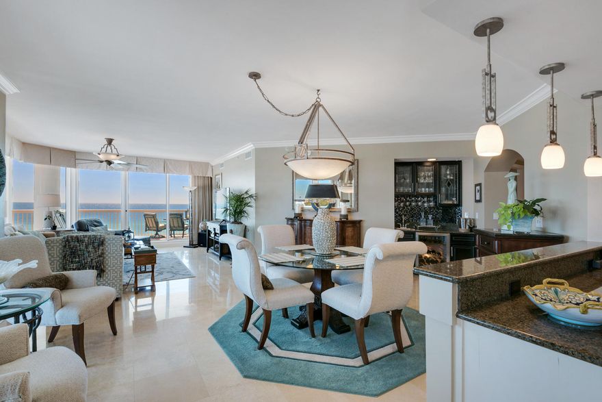 This absolutely stunning 3 bedroom/3 bath condo is located on the coveted east end of exclusive, rental restricted St. Thomas at Silver Shells. Sitting directly on the gulf and bordered to the east by Henderson Beach State Park, provides miles of endless unobstructed views. Step off your semi private elevator directly into your private elevator foyer. A large living/dining area with wet bar and a gourmet kitchen are perfect for entertaining. Wrap around balconies provide great outdoor space with terrace access from every room. In addition, there is a separate den that could be converted into a 4th bedroom. Beautiful travertine flooring, with inlaid design, are in all living areas, with carpet in the bedrooms. The master bedroom is spacious with a large custom closet. The master bath has