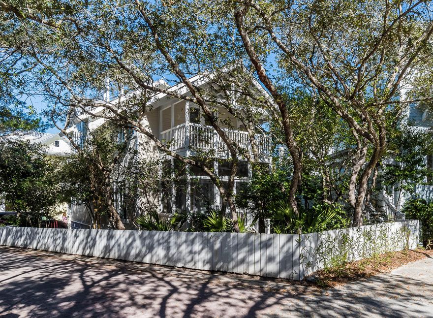 Wave Length sits on the highest point in Seaside shaded behind a garden of live oaks, magnolias and other native vegetation. The home was professionally redesigned and upgraded bottom to top. Wood used throughout on ceilings, walls and floors and painted a crisp white. Custom made linen window shades and drapes allow the light to filter inside. The front living area with custom designed day bed has 2 extra-large twins and serves as a sofa during the day. A wall of book shelves and a perimeter shelf will show off your collection of sea shells. A second living area includes a queen sleeper sofa. The breakfast bar is adjacent to the dining area with under counter ice machine & beverage refrigerator. The custom designed kitchen is a chef's dream: Carrera marble countertops, custom made