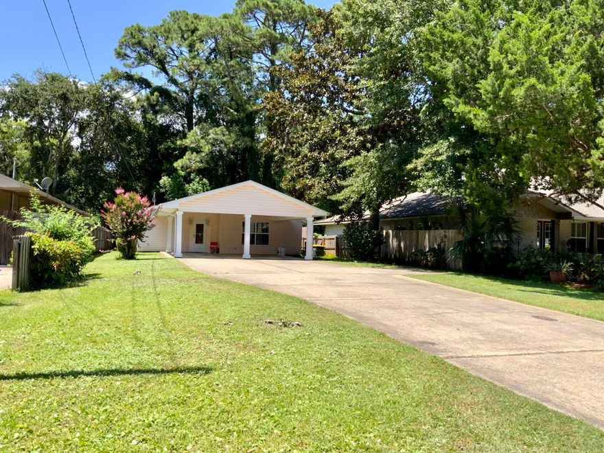 Do you need a 4 bedroom, 3 bath home?  Look no further!  Located near downtown Fort Walton  with the beaches, shopping, restaurants and both Hurlburt & Eglin AFB minutes away.  This lovely home has been updated over the years.  The dining room is open to the living room with the kitchen convenient to both.  A large master bedroom w/walk-in closet and an additional bedroom w/full bath are separate from the 2 additional bedrooms.  The back bedrooms share a full bath in this split floor plan home.  There are 2 deck areas, one is off the living room and one is off the kitchen/utility room.  Parking shouldn't be a problem with the long driveway and big carport.  There is a bump out from the driveway for added use of space for boat, jet ski's etc.  The roof was replaced in 2015.