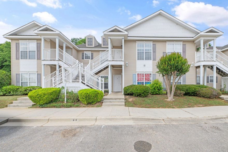 Spacious and inviting 3-bedroom, 2-bath 2nd floor condo in a prime central location close to shopping, dining, and everyday conveniences. Featuring brand-new luxury vinyl plank flooring throughout, stainless steel appliances, fresh paint, and soaring ceilings that enhance the open-concept layout.As you walk in, you'll find both guest bedrooms positioned near the front for convenience and privacy. The kitchen offers an island and overlooks the dining and living areas, ideal for entertaining or enjoying a cozy night in. The primary suite is tucked away for added comfort.  Soak up the sun at the community pool just steps away! BONUS: Cat lovers will appreciate the custom ''catio'' on the back patio, perfect for your furry friend, and easily removable if not needed.