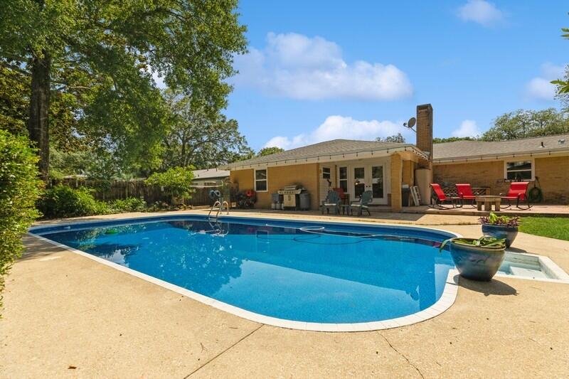 This gem is nestled in the heart of Kenwood & located across the street from the back gate of Kenwood Elementary! If you need space, this is the place--4BR/3BA--2098sq!! New pool liner...New water heater...New electrical panel 2023...New roof 2019...Impact-rated replacement windows w/hurricane shutters...Two primary bedrooms w/private baths & one with Murphy bed feature...Kitchen features commercial-grade stovetop & hood, abundant storage & prep island...Shady lanai overlooks the pool...Side yard large enough to park 22' boat...All-brick construction...Easy access to Kenwood Park, Okaloosa Technical College, Liza Jackson, Eglin AFB, Duke Field, Hurlburt Field, Golf, Tennis Courts, Beaches, Restaurants, Shopping & Destin/FWB Airport! Located in the city limits of FWB with City services!
