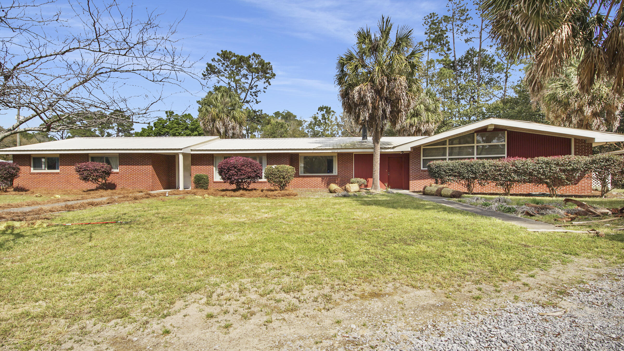 PRICED TO SELL. Located on Back Lake a natural spring fed lake, perfect for water skiing, and all other water sports. Excellent fishing. Located in the city limits of Defuniak Springs. Almost 2 acres. Fenced back yard. Attached workshop. Move in ready, Seller firm on list price.