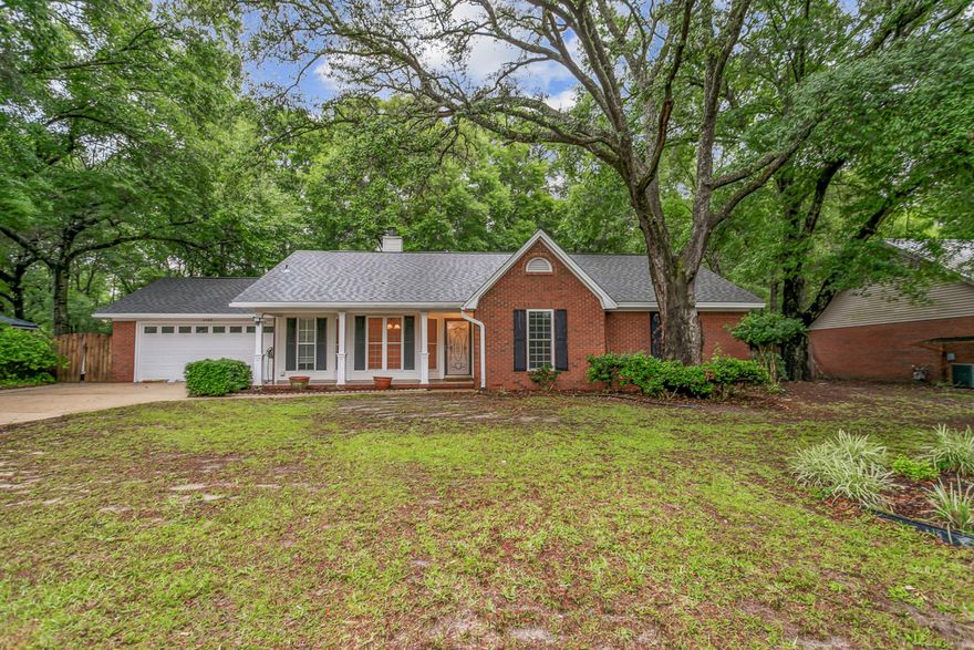 An Exceptional Brick Home in South Crestview: Discover this remarkable residence in the prestigious Savannah Oaks community. Known for its tranquil setting and elegant charm, this home boasts a striking brick exterior and a new roof. Enjoy relaxation in the glass-enclosed sunroom or screened Florida room. The garage features built-in cabinetry, while the rear yard hosts a spacious yard and a Workshop with AC and Electricity. Inside, find a well-appointed kitchen with maple cabinets and stainless steel appliances, complemented by vaulted ceilings. Cozy up by the stone fireplace or retreat to the master suite with a window enclosed area.
