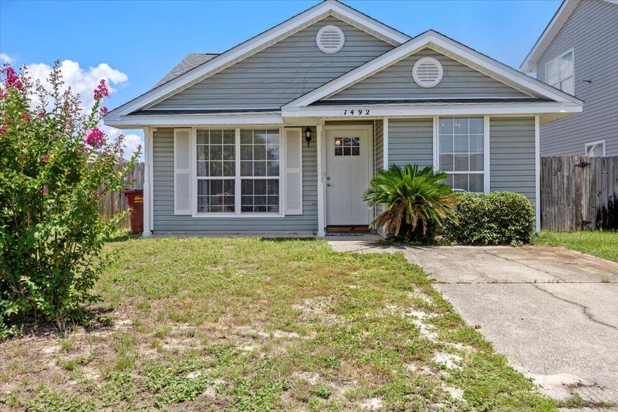 Investor, empty nester or first&#8209;time homebuyer? This newly renovated, adorable gem in Autumn Trace at Harvest Village features vaulted ceilings and an open living/kitchen/dining layout ideal for entertaining. The 2021 roof and vinyl siding offer low maintenance, while both bedrooms include ceiling fans and the secondary/flex space opens directly to a fenced-in backyard. The all-new appliances include washer/dryer, dishwasher, refrigerator & electric water heater. Located just 3 minutes west of the Navarre Bridge to the stunning beaches and a mile to restaurants, this home has a solid rental history. Nice cosmetic updates include countertops, cabinets and LVP throughout making this home an attractive find in Navarre for under $250,000!  Don't miss out!