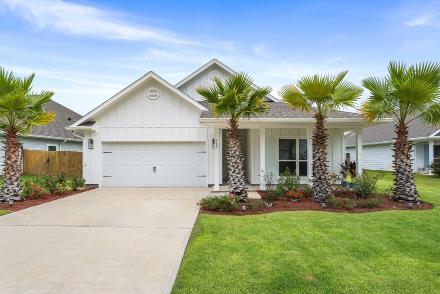 Discover timeless craftsmanship, thoughtful design, and your own private oasis in this fully custom 4 bedroom, 2 bath and 2-car garage home located on a cul-de-sac in The Preserve at Paradise Cove. Nestled amongst manicured lawns, lush trees and backing up to a wooded preserve that overlooks a serene backyard lake offers a rare combination of privacy, beauty, and convenience. Enhanced with over $115K of custom indoor and outdoor upgrades, every detail has been designed for both style and function. From ship lap accented walls, custom built-ins, and solid wood doors throughout to professional landscaping with pavers and fire pit, this home is a true showcase of elevated living in Point Washington. Additional property upgrades and features include a custom Murphy bed for flexible space in one of the three guest bedrooms, custom built-in shelving in pantry, laundry room and closets, upgraded lighting with designer kitchen lights, installation of attic stairs, fresh new sod, irrigation system, gutters, and solar panels for modern efficiency. Interior highlights feature 9' ceilings, quartz countertops, stainless steel appliances, shaker cabinets, and wood-grain EVP flooring throughout. Smart home technology, including KwikSet keyless entry, Skybell doorbell, Echo Dot, and a Quolsys touch panel, allows seamless control of lighting, temperature, and security. The Preserve at Paradise Cove offers peace and convenience just minutes from 30A's beaches, Eden Gardens, Choctawhatchee Bay, and scenic biking and hiking trails.