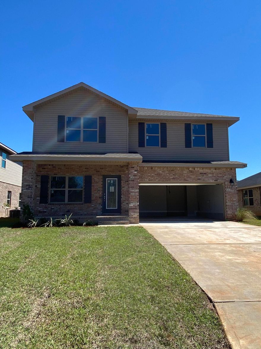 This 2 story home is 3105 square foot with 6 bedrooms and 3.5 bathrooms! This home does not just have 6 bedrooms it also has a bonus room upstairs and a spacious master bedroom. It is being built in our new neighborhood in North Crestview, awesome location! It is 4 sided brick, has an automatic 2 car garage, fully sodded with irrigation and some landscaping. Some upgrades that were added to this home include granite countertops in the kitchen, upgraded flooring everywhere with carpet only in the bedrooms, and a separate shower and garden tub with a window above in the Master bedroom. This one will not last long.