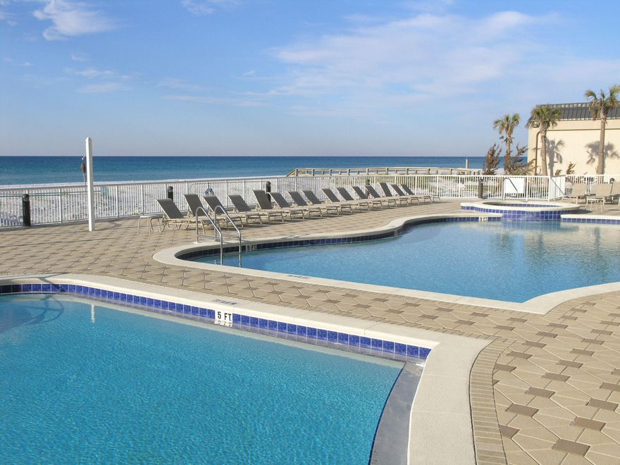 This 2-bedroom, 2-bath, plus bunk room condo overlooks the pool and Gulf of Mexico. This ground floor condo allows for direct access to the pool and beach without the need for stairs or elevators and is a favorite for rental guests. Its open floor plan is ideal for entertaining and enjoying views of the water and white sand beaches. The master bedroom is gulf front and opens onto the brick pavered patio and pool deck. The condo features tile floors throughout, granite counters and stainless steel appliances in the kitchen and is being sold completely furnished with an established book of business. Summer Place is centrally located on Okaloosa Island and within walking distance of area restaurants and boasts two gulf front pools, 200' of private beach and a gulf front workout room.